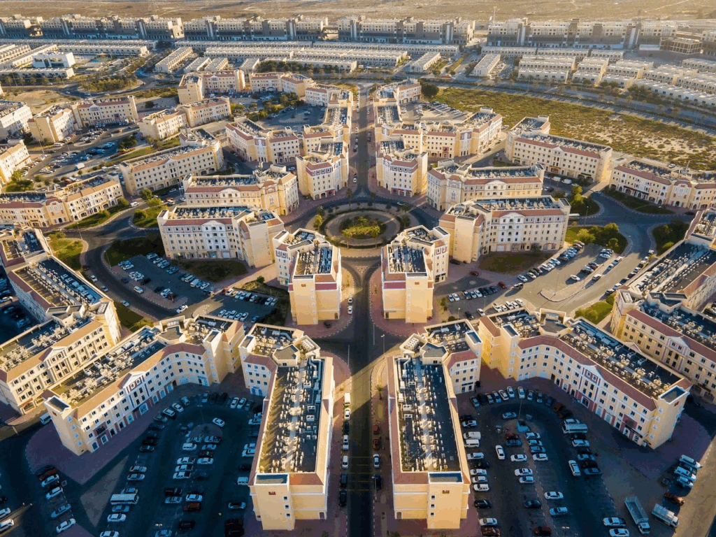Affordable 1-bedroom apartments in Dubai's International City with Dragon Mart in background.